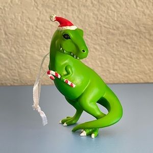 Christmas ornament t-rex green dinosaur in Santa’s hat